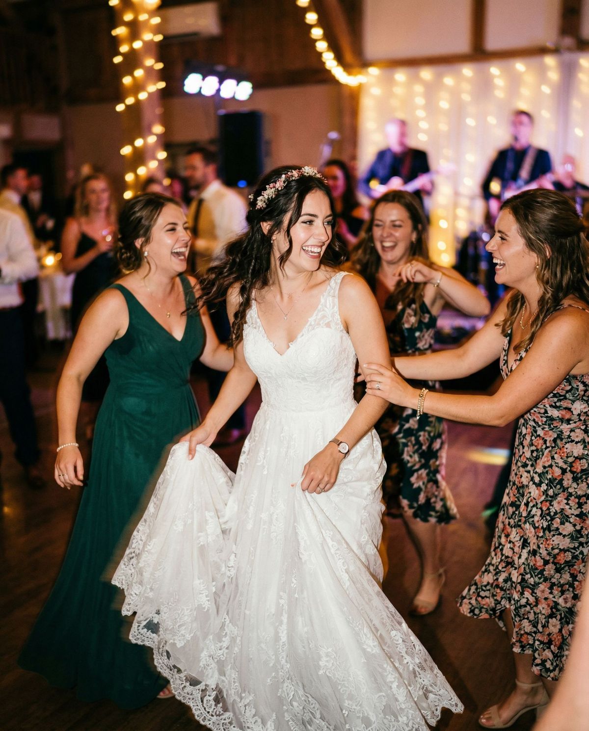Bride dancing with friends at a reception